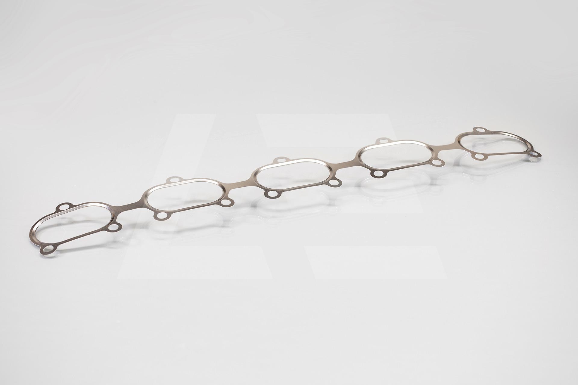 Porsche 98011141100 Прокладка выпускного коллектора Изображение №1