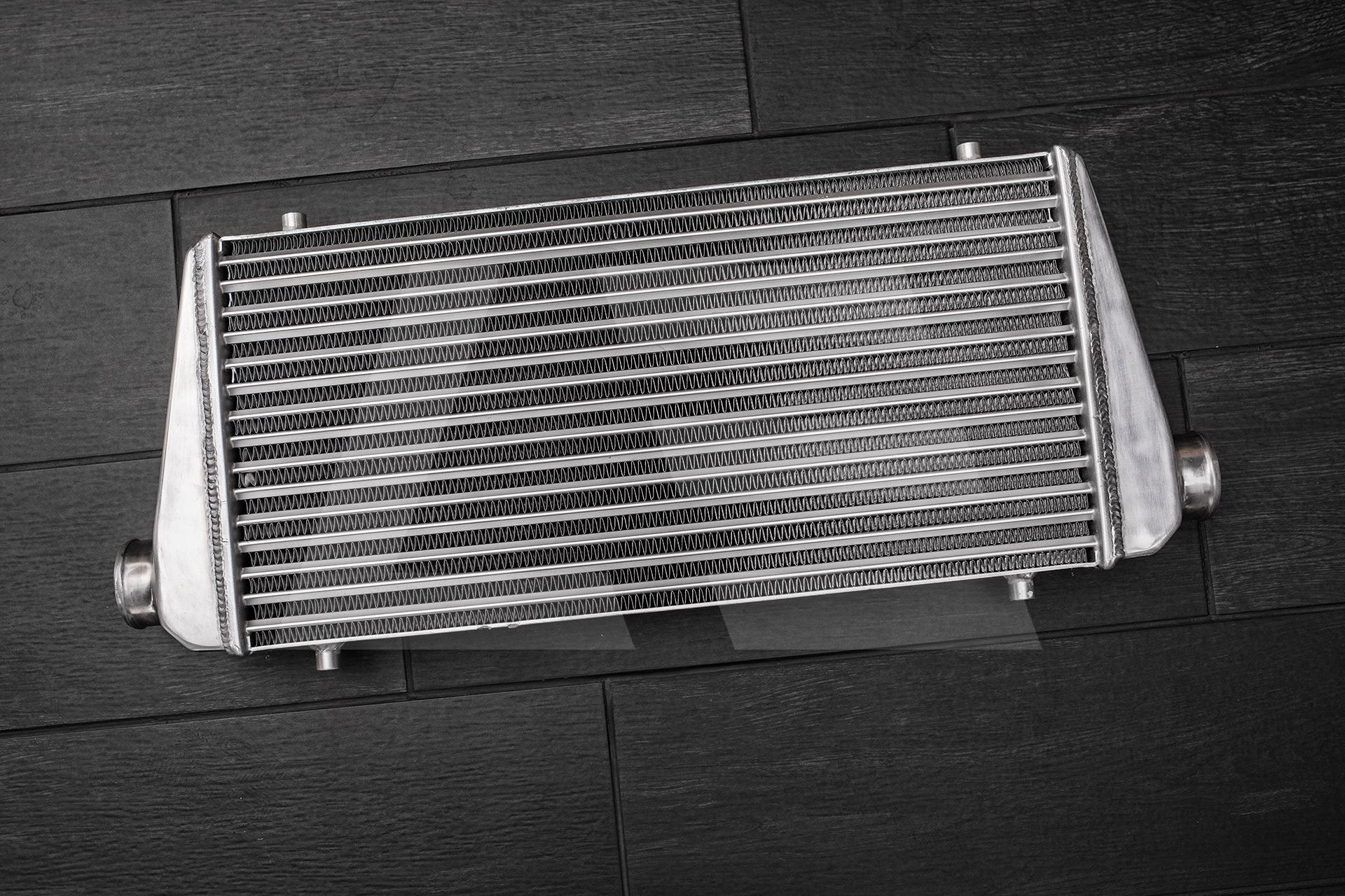 LEVEL Parts Интеркулер универсальный, 600мм*300мм*76мм (Вход / Выход 64мм) Изображение №1